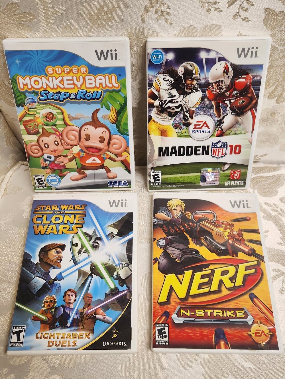 4 Wii games- Super Monkey Ball, MADDEN 10, Nerf, STAR WARS - Video Game Lot